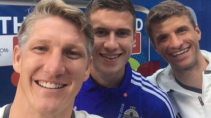 Bastian Schweinsteiger, Paddy McNair und Thomas Müller nach EM-Spiel 2016