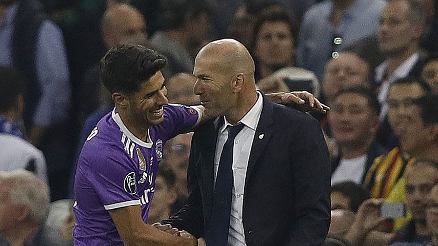 Fußballer Marco Asensio mit Zinedine Zidane