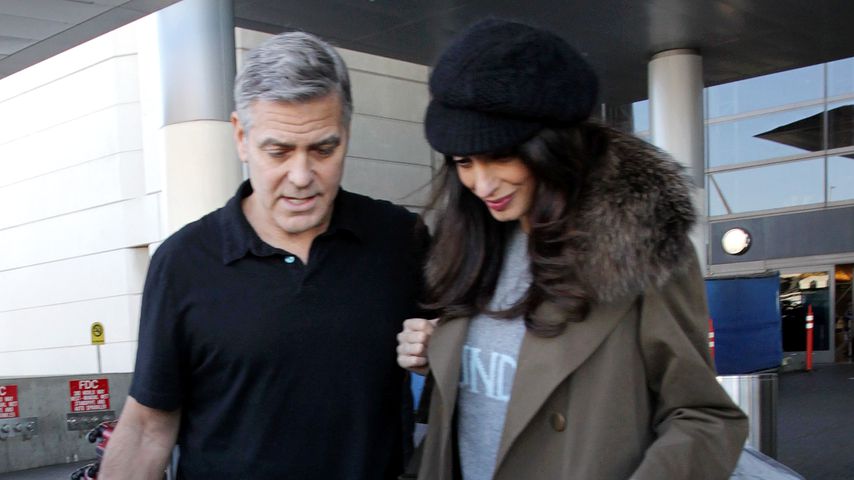 George und Amal Clooney am Flughafen von Los Angeles