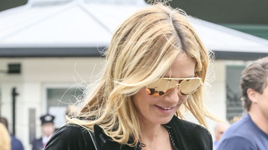 Heidi Klum mit ultra tiefem Ausschnitt in Wimbledon