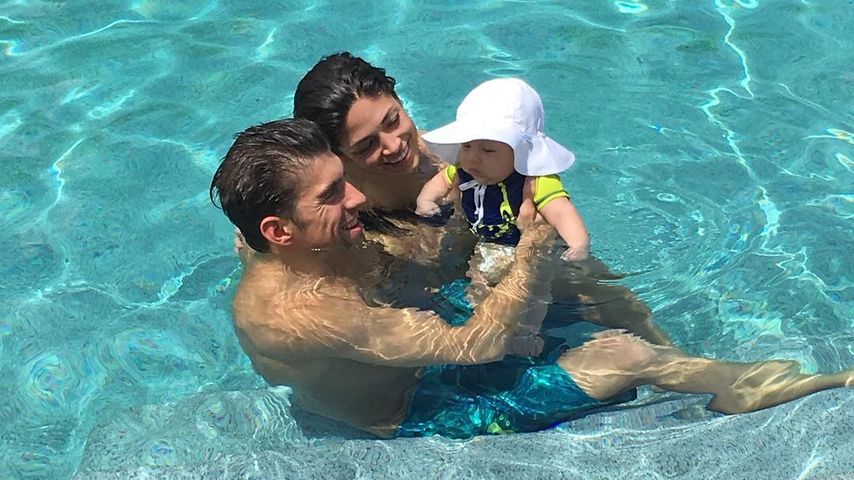 Michael Phelps mit seiner Freundin Nicole Johnson und dem gemeinsamen Sohn