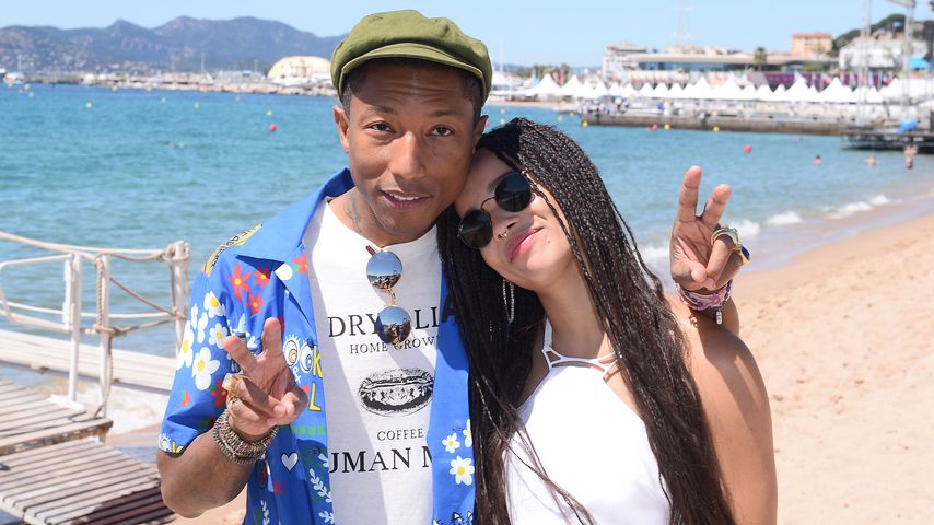 Zoe Kravitz und Pharrell Williams