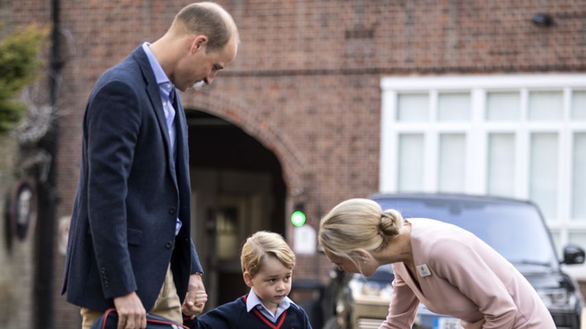 Prinz William, sein Sohn George und dessen Lehrerin auf dem Weg zur Schule
