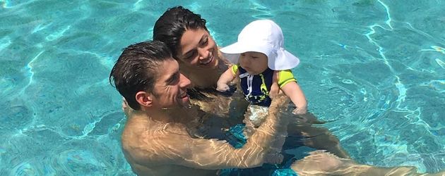 Michael Phelps mit seiner Freundin Nicole Johnson und dem gemeinsamen Sohn Michael Phelps mit seiner Freundin Nicole Johnson und dem gemeinsamen Sohn